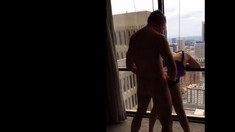 Mature girl fucked in front of hotel widow